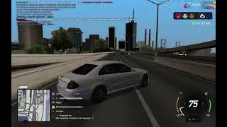 км