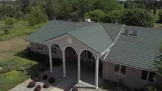 Rustic Shingle Metal Roof in Forest Green Drone Video - AMR of N. WI