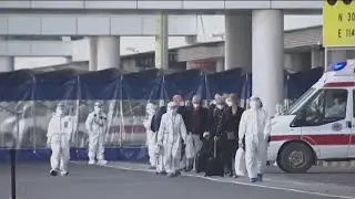 Scientific team arrives in Wuhan to probe origins of virus