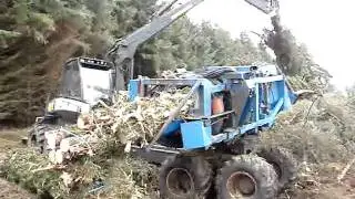 Kingwell Fiberpac 370B baler / bundler working on whole Spruce crop