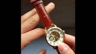 Como Programar Hora y Dar Cuerda a Un Reloj Mecanico