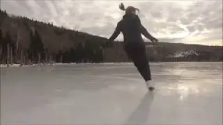 Figure Skater Filmed with Drone on Mountain Lake