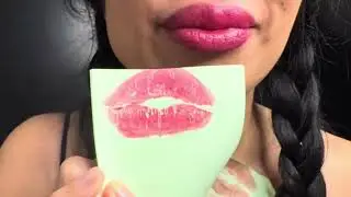 Loud squeaky kisses on paper ASMR