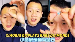 Xiaobai shows off rare diamonds
