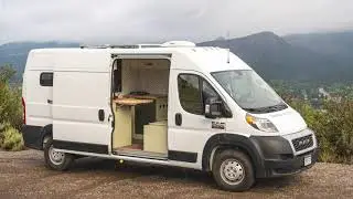 159 Promaster with a dog kennel, L bench, split kitchen and so much more!
