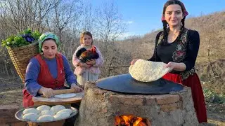 IRAN village life; Baking bread on fire