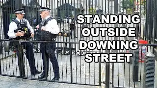 Downing Street, London -- Standing outside the gates