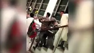 Fight breaks out between ASF security official & passengers at Islamabad airport!