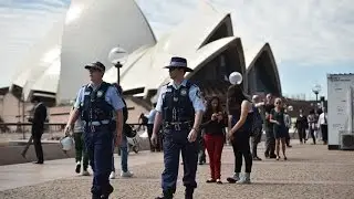 Australian police probe terror links after 15-year-old shoots dead worker outside headquarters