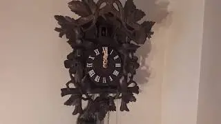 Restored Original Cuckoo Clock at midnight. wooden weights and bone hand clock Galantainteriors show