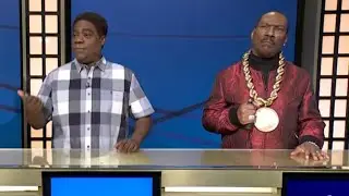 Eddie Murphy Nails Tracy Morgan Impression in SNL 50th 'Black Jeopardy' Skit&ndash; Leslie Jones Loses It!