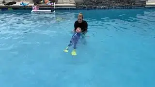 Baby Cooper during infant aquatics class
