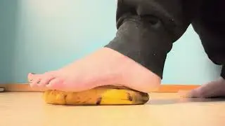 Foot crushing a banana 