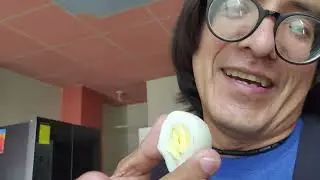 CIRCUS ACT: MAN EATS HALF AN EGG