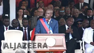 Haiti swears in new president after long-running crisis