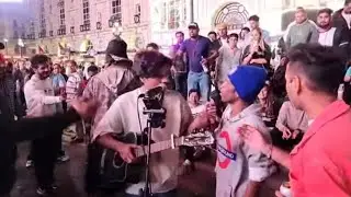 Homeless Drunken Duo Attacked For Disrupting Busker's Spotlight.