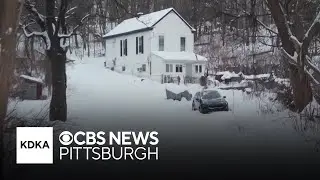 Days after storm, 12 inches of snow still covers street, leaving man stuck