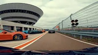 PORSCHE Taycan Electric Car on the Race Circuit from Porsche Leipzig. Gopro Hero 11
