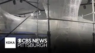 Exhibit uses miles of packing tape to open at museum