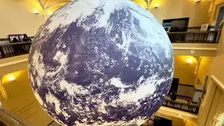 Huge planet Earth inside a building hall | Copyright-free video anyone can use Creative Commons