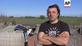 Volunteers turn on the light in remote Romanian villages