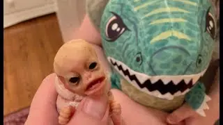 Our alien caterpillar creature is scared of the T-Rex Fuzzy Wubble!