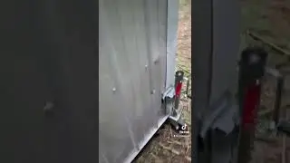 Moving a goat shed using trailer jacks