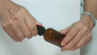 Tamper Evident dropper cap on Essential Oil Amber Glass Bottle