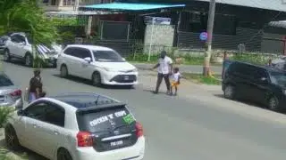 Caught on Cam: A Parent's Worst Nightmare - Driver Nudges Parent with Child