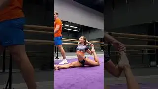 Close - up of Gymnast and Coach in Ring