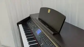 Yamaha Clavinova CVP-301 digital piano and stool in Rosewood stock number 22296