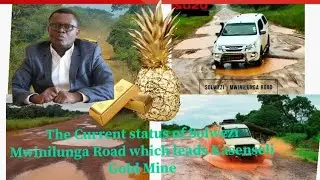 Hon Samakayi checking on the extent of the damage on Mwinilunga  Road.