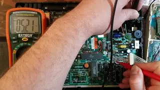 Diagnosing and repairing a dead Tandy TRS-80 Model 100 portable computer
