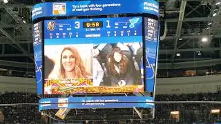Vegas Glitz lookalikes on jumbotron at Enterprise Center during St. Louis Blues game