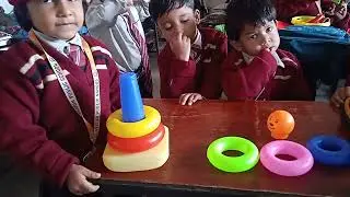 Stacking ring toy and colour name.