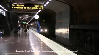 SL Tunnelbana tåg / Metro trains at Sundbybergs centrum station, Stockholm, Sweden