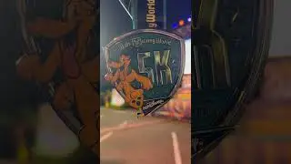 🏃&zwj;♂️ Pluto Shines on the Walt Disney World 5K Medal! 🐾✨Description