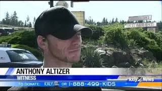 Motel surveillance video shows armed suspect chasing officer before shooting