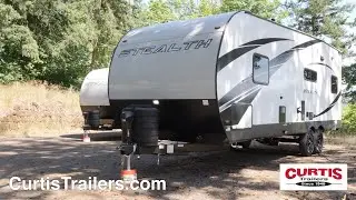 Check out this awesome Travel Trailer Toy Hauler, the Stealth FS2513GLE!