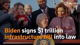 Biden signs $1 trillion infrastructure bill into law