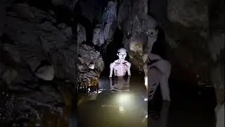 What waits in the shadows of this cave? #creepycreature #liminalspace #monster