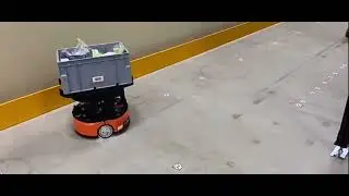 Tote robot picking with mini kiva and rfid scanning tunnels