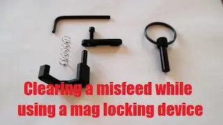 clearing a misfeed while using a mag lock device