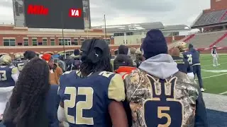 Varina football coach Marcus Lewis gets an ice bath following 47-0 state title win