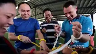 The magic rope handcuffs challenge team building for corporate event in Bangkok Thailand