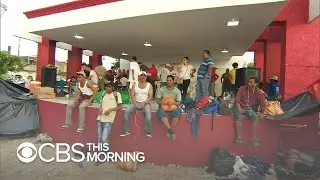 At current pace, migrant caravan won't reach U.S. border until December