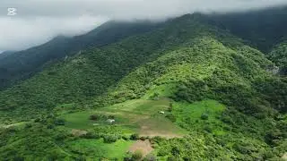 Lush Green Mountains Under Cloudy Skies #ytshorts #trendingshorts #viralshorts