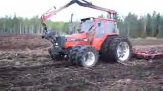 Valmet 705 clearing old forest to a field pt.2