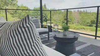 Private estate offered for sale on the north end of Camano Island, skybridge and shop