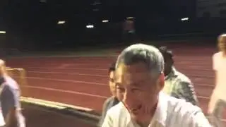 PM Lee greeting supporters at Toa Payoh stadium